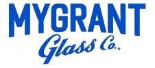 Blue text logo reads "MYGRANT Glass Co." with "MYGRANT" in block letters above “Glass Co.” in script font. White background.